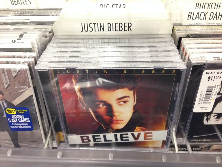 In this image an album that appears to be Justin Bieber's 
