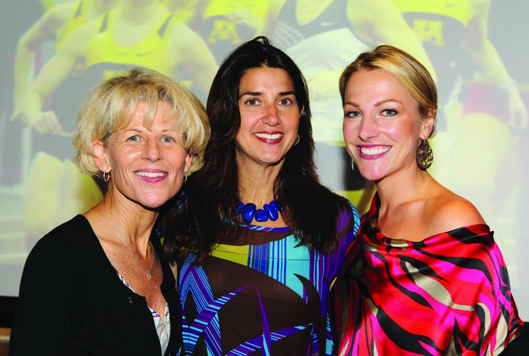 COMMERCIAL IMAGE - In this image provided by espnW, (L to R) UCLA Softball legend Sue Enquist, Laura Gentile, vice president, espnW, and ESPN SportsCenter Anchor Lindsay Czarniak attend the espnW Title IX photo mosaic unveil at the Newseum on Thursday June 21, 2012 in Washington. (Photo by Paul Morigi/Invision for espnW/AP Images)