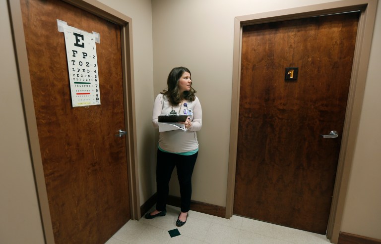 The Centers for Medicare and Medicaid Services has asked providers and others for information about concerns that third parties are helping patients pay premiums for private plans, which reimburse greater amounts than government health plans. (AP Photo/Mike Groll)