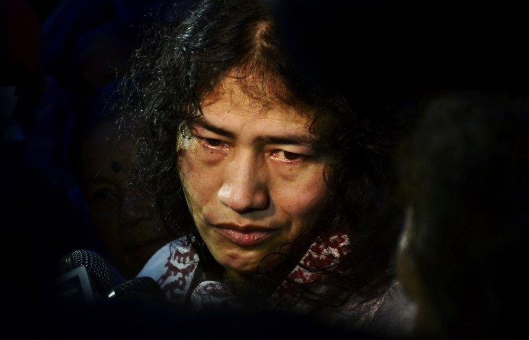 In this Wednesday, Aug. 20, 2014 photo,  Irom Sharmila speaks to the media outside a security ward after her release in Porompal district, in Imphal, India. India's most famous prisoner of conscience walked free after nearly 14 years in jail but vowed to continue the hunger strike that landed her in prison for attempted suicide.  Sharmila, 42, has not eaten a single morsel of food voluntarily since November 2000, when she began her protest against an Indian law that suspends many human rights protections in areas of conflict. (AP Photo/Bullu Raj)