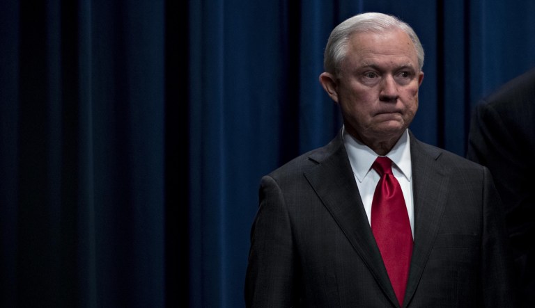 Jeff Sessions, U.S. attorney general, listens during a news conference at the Department of Justice in Washington, D.C., on Friday, Oct. 26, 2018.