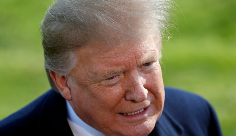 President Donald Trump speaks to the media after leaving the Oval Office of the White House, Thursday, March 28, 2019, in Washington, en route to Michigan. Trump will speak at a rally in Michigan before spending the weekend at his Mar-a-Lago estate in Florida.