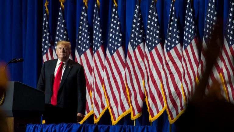 President Donald Trump pauses while speaking as members of the audience stand and applaud, at the National Association of REALTORS Legislative Meetings and Trade Expo, Friday, May 17, 2019, in Washington. 