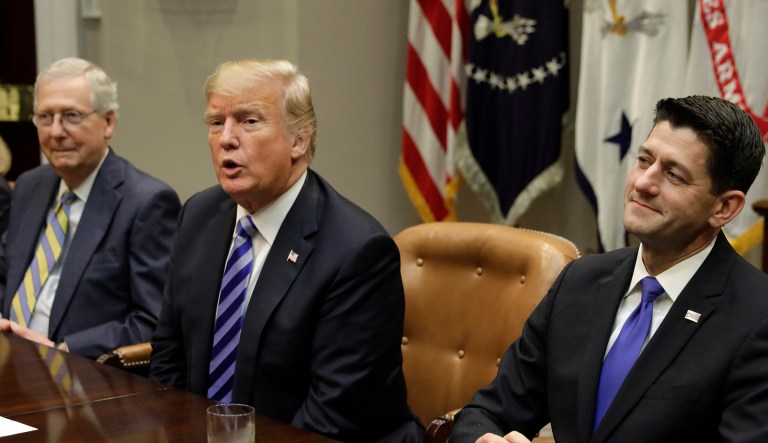 House Speaker Paul Ryan, a Republican from Wisconsin, right, listens as U.S. President Donald Trump speaks during a meeting with Republican Congressional Leadership in the Roosevelt Room of the White House in Washington, D.C., U.S.