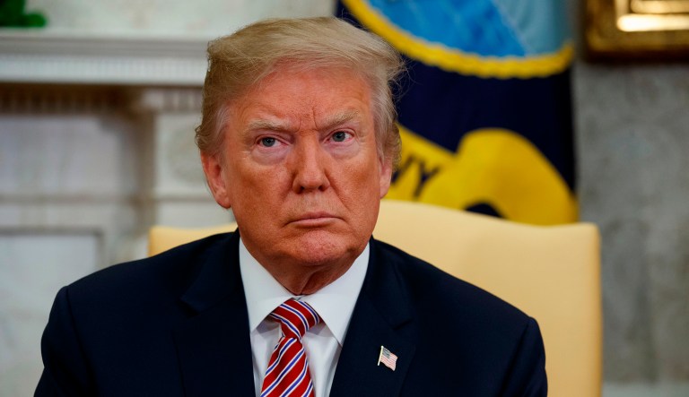 In this April 10, 2018, file photo, President Trump listens as he meets in the Oval Office of the White House.