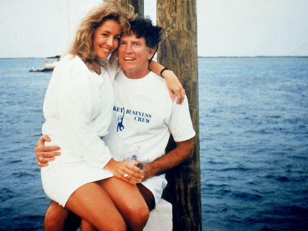 Former Sen. Gary Hart shown with model Donna Rice on a yacht named Monkey Business. 