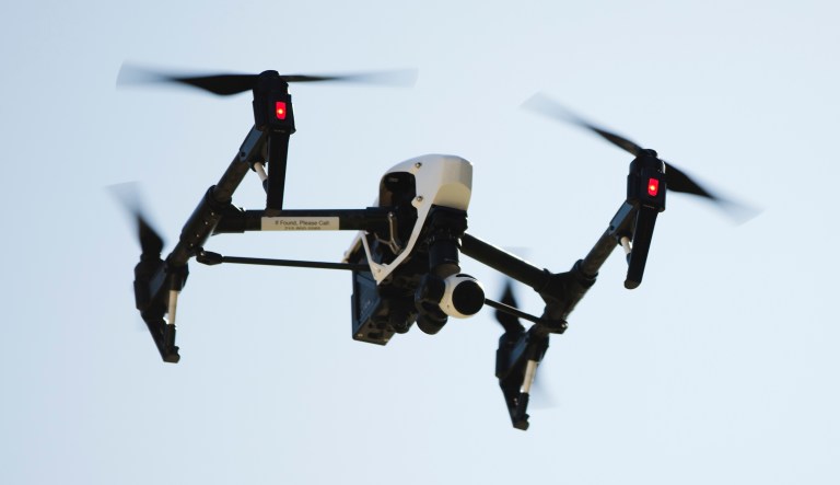 A DJI Mavic Pro 2 Enterprise with attached speaker for emergencies hovers while controlled by members of the Meriden police and fire departments at the William Dunn Sport Complex on Thorpe Avenue in Meriden, Wed., Jan. 22, 2020.