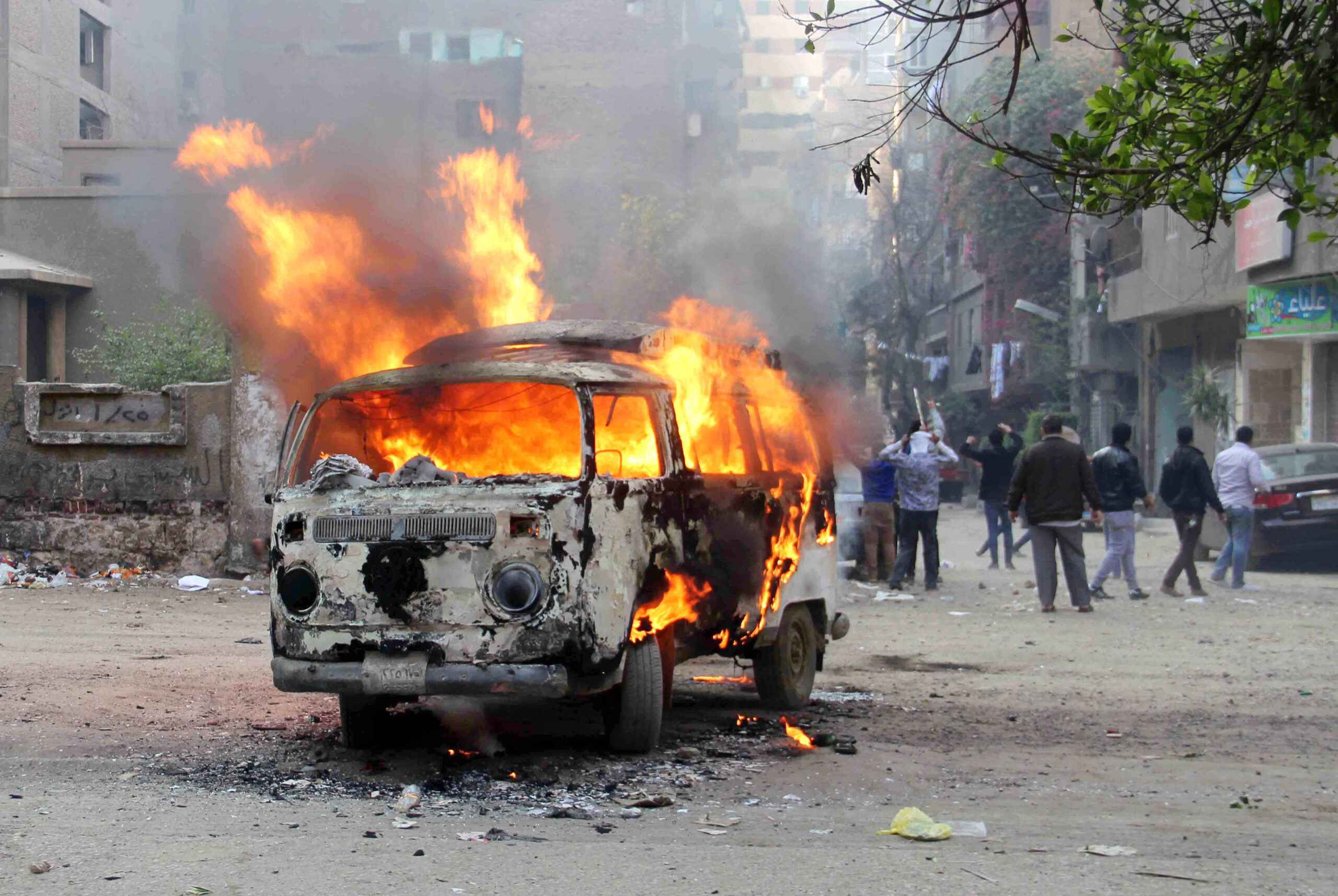 Gunmen kill Egypt policeman as 1 killed in protest