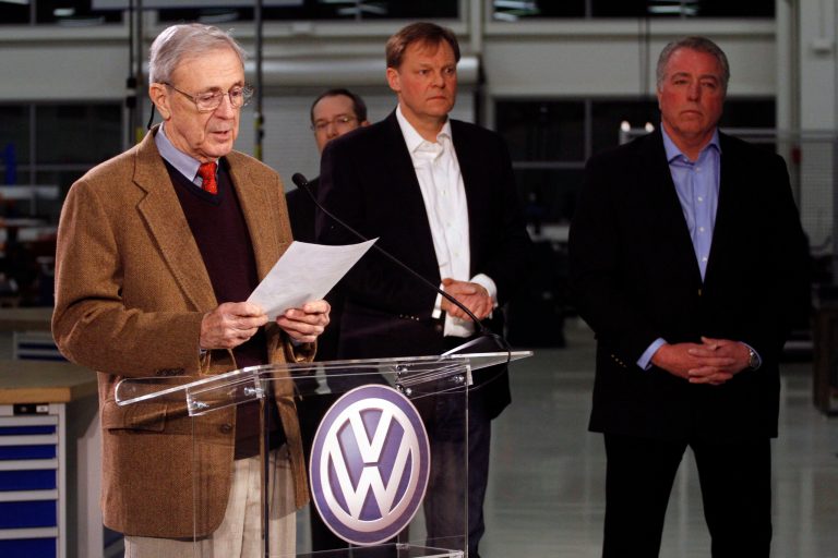 Retired circuit judge Sam Payne, left, announces that Volkswagen employees voted to deny representation by the United Auto Workers union, on Friday in Chattanooga, Tenn. (AP Photo/Chattanooga Times Free Press, Dan Henry)ÃÂ 