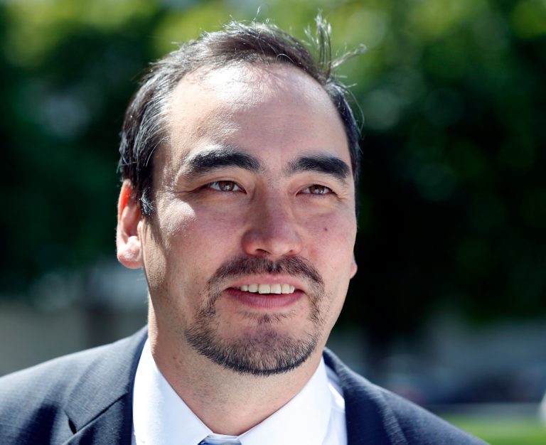Tim Wu, a candidate for New York lieutenant governor, talks to reporters outside the state Capitol on Thursday, Aug. 28, 2014, in Albany, N.Y. The New York Times has endorsed Wu, who is running alongside liberal gubernatorial candidate Zephyr Teachout, over Gov. Andrew Cuomo's running mate Kathy Hochul. (AP Photo/Mike Groll)