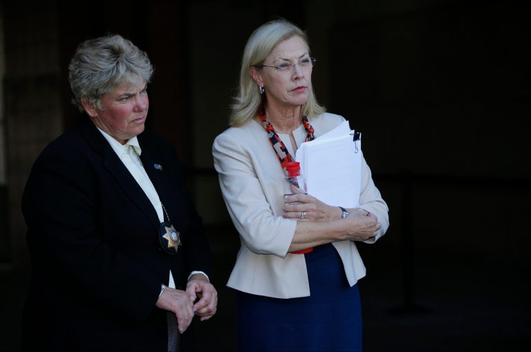 California State University, Northridge, CSUN president Dr. Dianne Harrison, right, holds a report regarding Pi Kappa Phi fraternity hazing activities that lead to the death of CSUN student Armando Villa, during a news conference at the CSUN campus in Northridge, Calif., on Friday, Sept. 5, 2014. CSUN President Harrison released the results Friday of an investigation into the July death of 19-year-old Armando Villa, who passed out during a hike with Pi Kappa Phi pledges in the Angeles National Forest. Illegal hazing was involved in a fraternity hike that killed a freshman. Harrison said there wasn't enough water during the 18-mile hike. At left, CSUN Police Chief, Anne Glavin. (AP Photo/Damian Dovarganes)