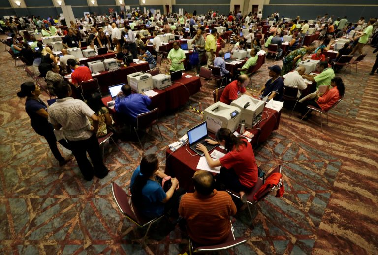 AP-GfK Poll: Divided voters still focus on economy