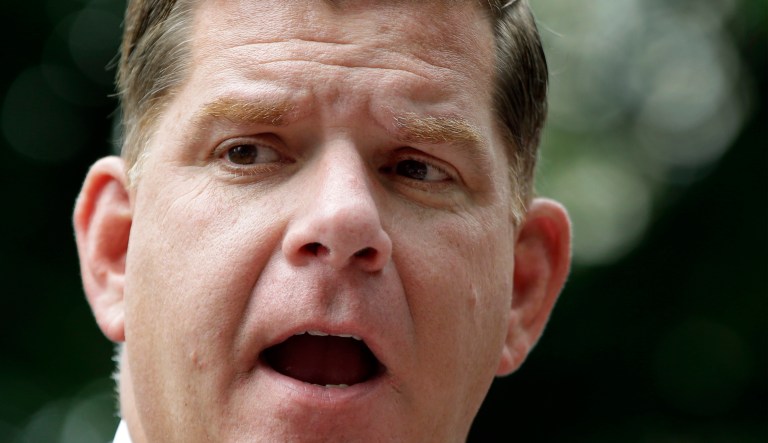 The founder of an alt-right men's organization said he believes Boston's Democratic mayor, Marty Walsh, above, is using the Charlottesville tragedy to his political advantage.