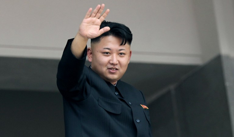 FILE - In this July 27, 2013 file photo, North Korea's leader Kim Jong Un waves to spectators and participants of a mass military parade celebrating the 60th anniversary of the Korean War armistice in Pyongyang, North Korea. North Korea's young leader wasn't in his customary seat as the country convened its rubber-stamp parliament Thursday, Sept. 25, 2014, adding to South Korean media speculation that Kim may be ill. (AP Photo/Wong Maye-E, File)