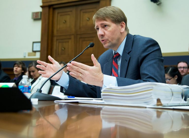 Consumer Financial Protection Bureau Director Richard Cordray testifies on Capitol Hill in Washington, Thursday, Sept. 12, 2013, before the House Financial Services Committee hearing on 