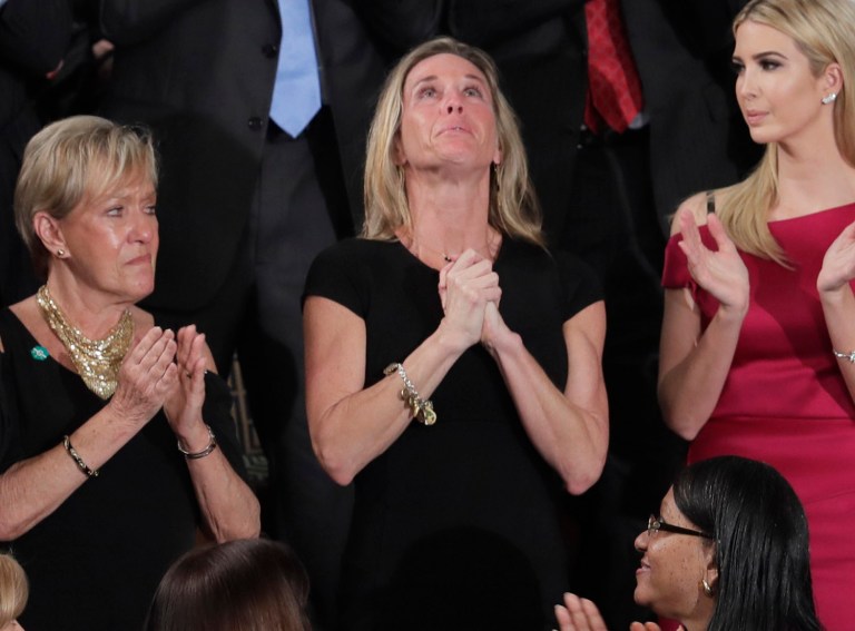 Carryn Owens' heartfelt public moment is now tied to the Yemen raid. (AP Photo/J. Scott Applewhite)