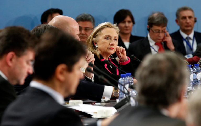   Secretary of State Hillary Rodham Clinton listens during the North Atlantic Council (NAC) meeting at NATO headquarters in Brussels, Tuesday, Dec. 4, 2012. (AP Photo/Kevin Lamarque, Pool)  