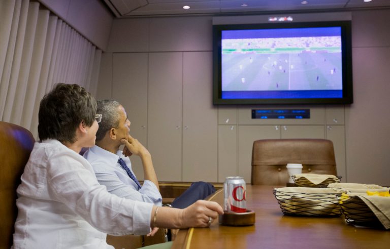 President Barack Obama and White House Senior Adviser Valerie Jarrett watch the World Cup soccer match between US and Germany aboard Air Force One enroute to Minnesota, Thursday, June 26, 2014. (AP Photo/Pablo Martinez Monsivais)