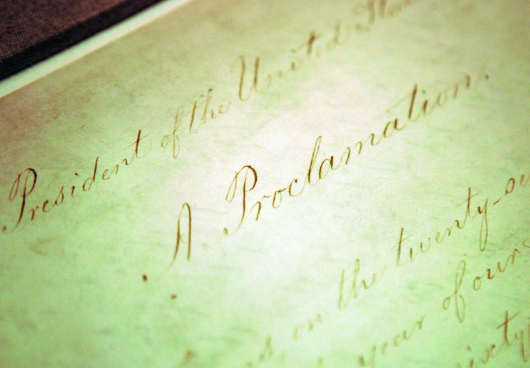 FILE - This Feb. 18, 2005 file photo shows the original Emancipation Proclamation on display in the Rotunda of the National Archives in Washington. As New Year's Day approached 150 years ago, all eyes were on President Abraham Lincoln in expectation of what he warned 100 days earlier would be coming _ his final proclamation declaring all slaves in states rebelling against the Union to be 
