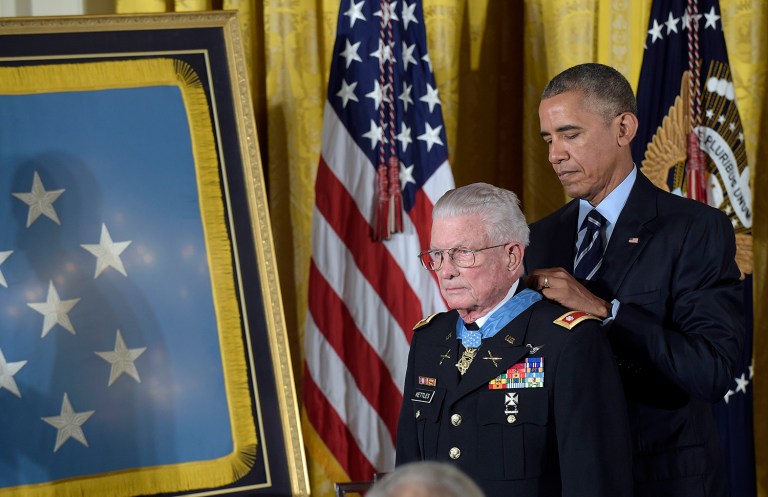 President Obama presents the Medal of Honor to retired Army Lt. Col. Charles Kettles of Michigan. Kettles is credited with saving the lives of 40 soldiers and four of his own crew members. (AP Photo/Susan Walsh)