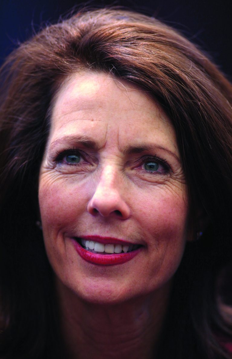 FILE - In this Jan. 8, 2009 file photo, Michigan Supreme Court Justice Diane Hathaway smiles following an investiture ceremony at the Michigan Hall of Justice in Lansing, Mich. Federal prosecutors filed a fraud charge against Hathaway, Friday, Jan. 18, 2013, just a few days before she leaves the state's highest court in a scandal involving the sale of a Detroit-area home and suspicious steps taken to conceal property in Florida. (AP Photo/Al Goldis, File)