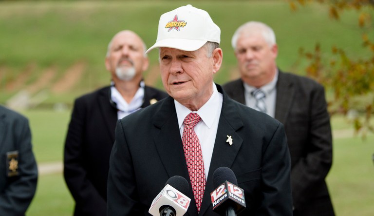 Moore emphatically denied ever knowing or having any interaction with Leigh Corfman, who accused him of making sexual advances with her when she was 14 and he was 32. (Albert Cesare/The Montgomery Advertiser via AP)