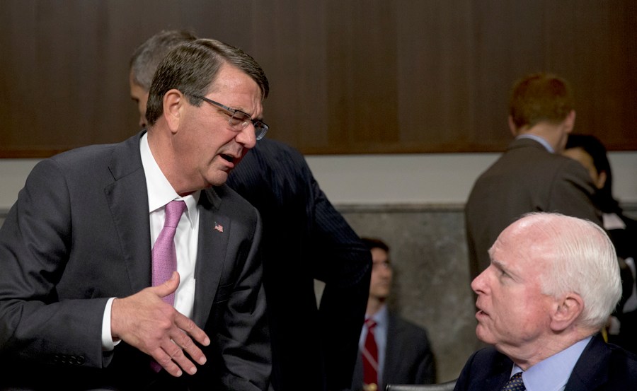 Carter defends recruitment program from McCain attacks