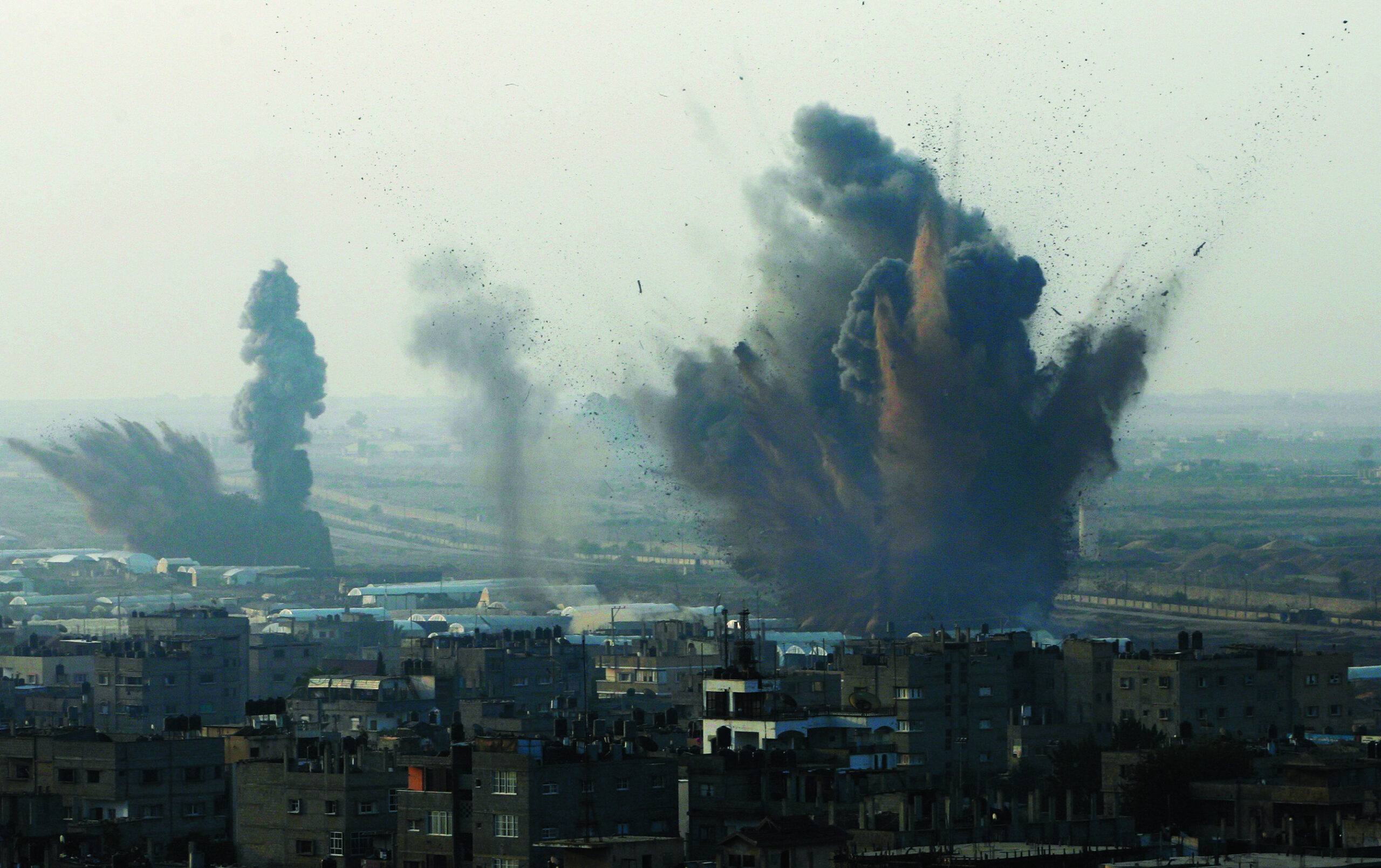 Israel, Hamas trade fire and tough truce proposals