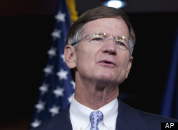 Rep. Lamar Smith, Chairman of the House Committee on Science, Space and Technology, is calling for an FBI and Department of Justice Inspector General probe of allegations of improper political influence against a prosecution of foreign nationals working at NASA's Research Center near San Francisco. Joining the Texas Republican is Virginia Rep. Frank Wolf, who chairs a key subcommittee of Smith's panel. (AP Photo) 