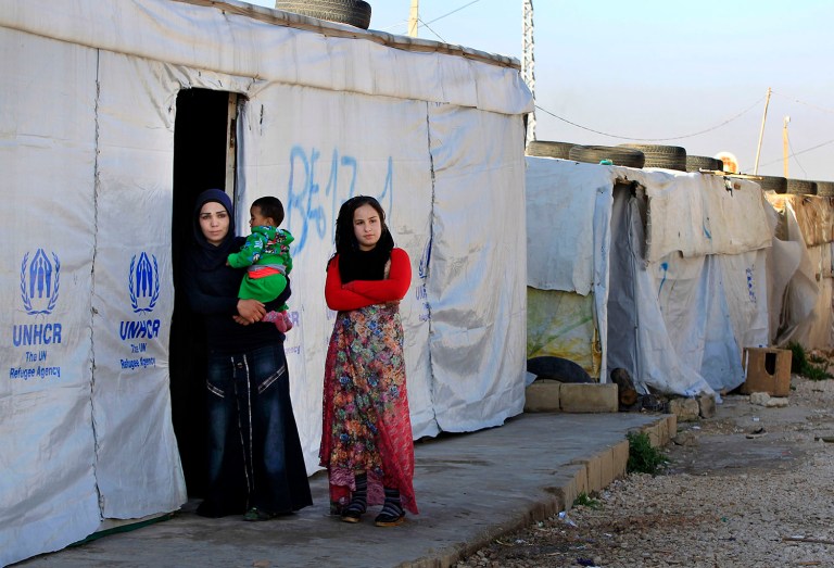 Six months into fiscal year 2016, which started Oct. 1, only about 1,200 Syrian refugees have been admitted. That leaves about 8,800 more that State said officials are not giving up on, even if it means a stepped up pace for admitting them through Sept. 30. (AP Photo/Bilal Hussein)