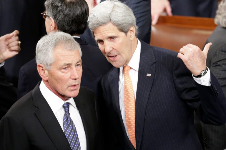 Secretary of State Jonh Kerry talks with Defense Secretary Chuck Hagel on Capitol Hill in Washington, Tuesday, Jan. 20, 2015, before the start of President Barack Obama's State of the Union address before a joint session of Congress. (AP Photo/Pablo Martinez Monsivais)