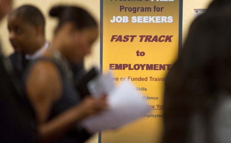 The number of Americans with full-time jobs actually fell 240,000 in June while the number of Americans with part-time jobs surged 360,000. (AP Photo/John Amis)