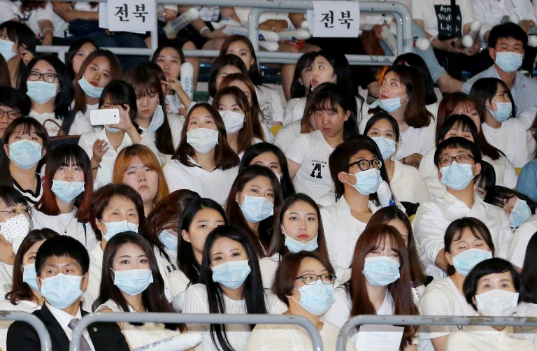 Nurses wear masks as a precaution against the MERS virus as they attend an International Conference of Nurses in Seoul, South Korea. (Baek Seng-ryul/Yonhap via AP)