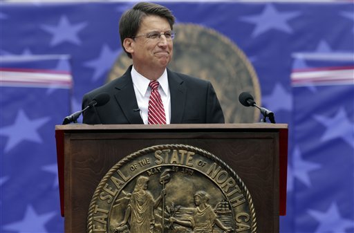 North Carolina Gov. Pat McCrory smiles as he delivers his inaugural address after taking the oath of office during ceremonies at the state Capitol in Raleigh, N.C., Saturday, Jan. 12, 2013.  McCrory and Lt. Gov. Dan Forest already took the oaths of office several days ago, but both got sworn in a second time. (AP Photo/Gerry Broome)