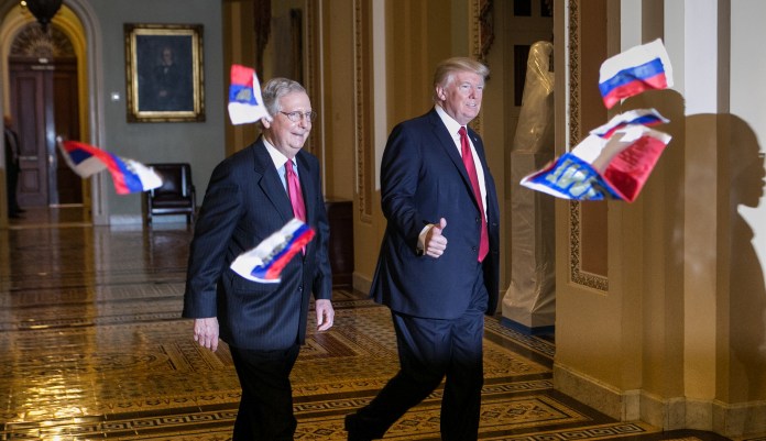 Trump encountered the protester shortly after entering the Capitol with Senate Majority Leader Mitch McConnell. Multiple reporters present said the man repeatedly yelled "Trump is treason" before being apprehended by Capitol police. (Graeme Jennings/Washington Examiner)