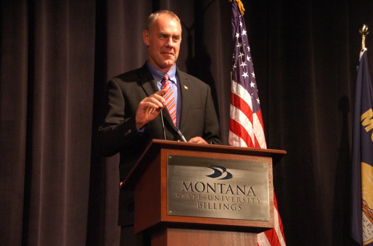 Republican Ryan Zinke is seen at the start of a U.S. House debate in Billings, Mont., on Monday, Sept. 29, 2014. Zinke stressed the need for a smaller federal government to reduce hurdles faced by the private sector. (AP Photo/Matthew Brown)