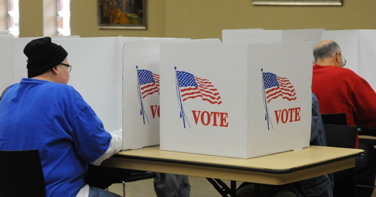 Voters cast their ballots at a polling station at the Community Center November 4, 2014 in Brooklyn, Iowa. (Photo by Steve Pope/Getty images)
