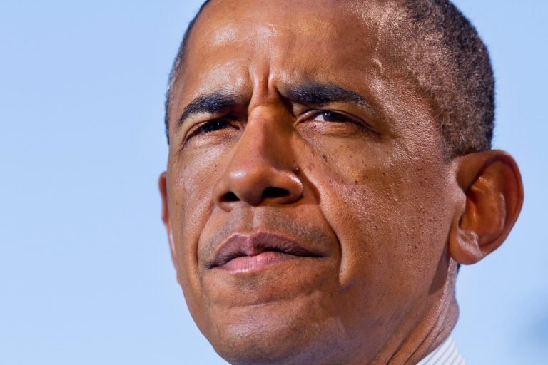 President Barack Obama pauses while speaking, Wednesday, July 9, 2014, at Cheesman Park in Denver. (AP Photo/Jacquelyn Martin)