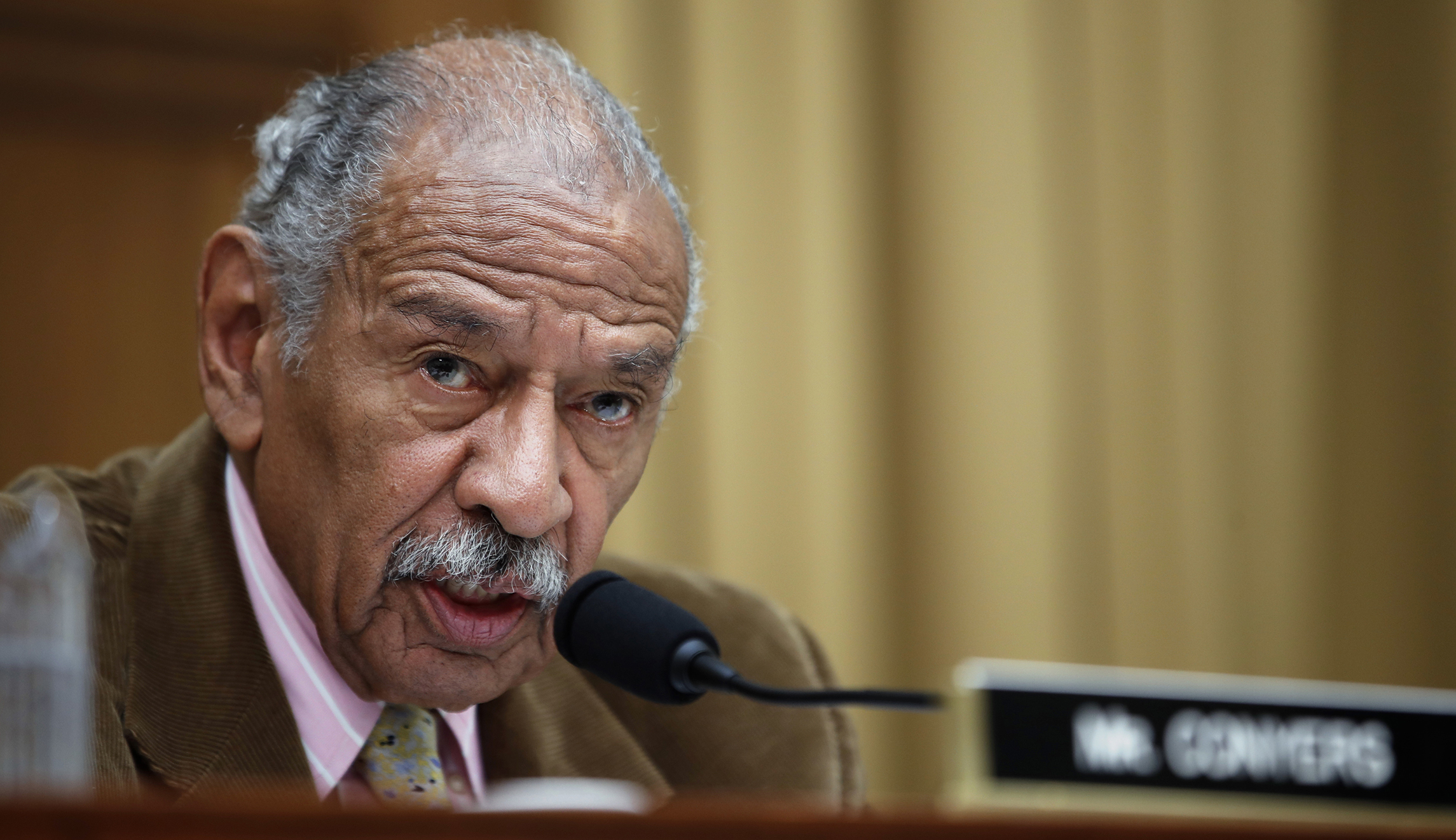 Former female staffer accuses John Conyers of rubbing her thighs while sitting in front row at church