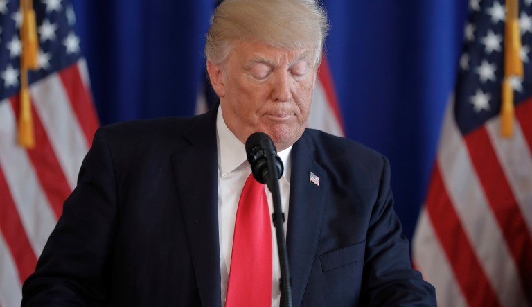 President Donald Trump pauses while speaking regarding the ongoing situation in Charlottesville, Va., Saturday, Aug. 12, 2017 at Trump National Golf Club in Bedminster, N.J. (AP Photo/Pablo Martinez Monsivais)