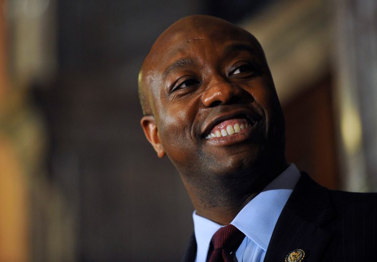   U.S. Rep. Tim Scott smiles during a press conference announcing him as Jim DeMint's replacement in the U.S. Senate at the South Carolina Statehouse on Monday, Dec. 17, 2012, in Columbia, S.C. South Carolina Gov. Nikki Haley announced Scott, as Sen. Jim DeMint's replacement, making him the only black Republican in Congress and the South's first black Republican senator since Reconstruction. (AP Photo/Rainier Ehrhardt)  