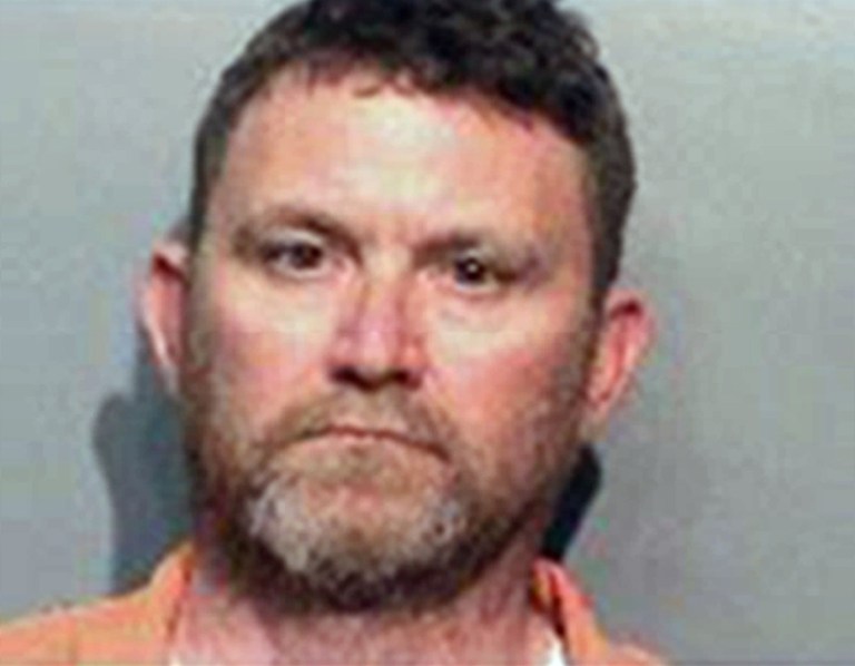 This undated photo provided by the Des Moines Police Department shows Scott Michael Greene, of Urbandale, Iowa. Des Moines and Urbandale Police said in a statement Wednesday, Nov. 2, 2016, that they have identified Greene as a suspect in the killings early Wednesday morning of two Des Moines area police officers. The two officers were shot to death in separate ambush-style attacks while they were sitting in their patrol cars. (Des Moines Police Department via AP)