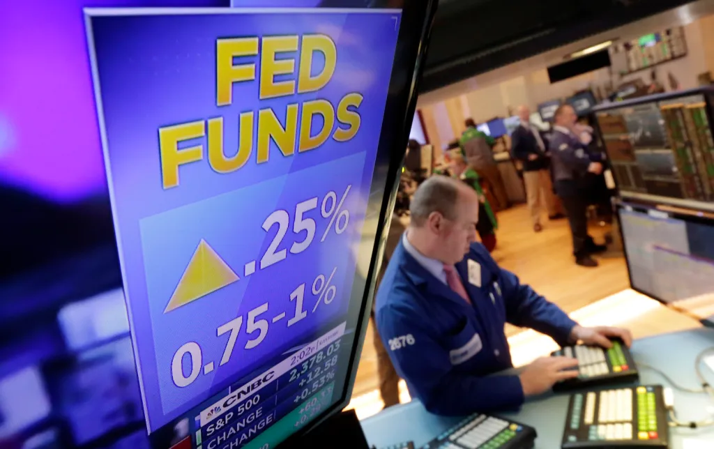 Fed holds off on rate hike, but downplays weak first-quarter growth