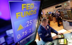 Fed holds off on rate hike, but downplays weak first-quarter growth