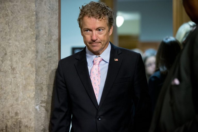 Republican presidential candidate Sen. Rand Paul, R-K.Y., arrives before Secretary of State John Kerry, Secretary of Energy Ernest Moniz, and Secretary of Treasury Jack Lew, arrive to testify at a Senate Foreign Relations Committee hearing on Capitol Hill, in Washington, Thursday, July 23, 2015, to review the Iran nuclear agreement. (AP Photo/Andrew Harnik)