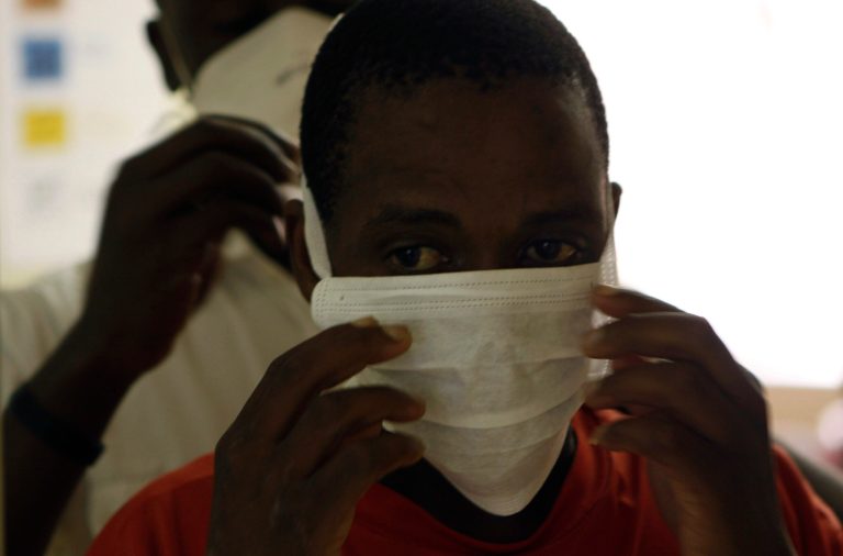   In this photo taken Thursday, Nov. 15, 2012 an unidentified patient prepares to be tested for TB, at the US sponsored Themba Lethu, HIV/AIDS Clinic, at the Helen Joseph hospital, in Johannesburg. In the early 90s when South Africaâs Themba Lethu clinic could only treat HIV/AIDS patients for opportunistic diseases, many would come in on wheelchairs and keep coming to the health center until they died. Two decades later the clinic is the biggest ARV (anti-retroviral) treatment center in the country and sees between 600 to 800 patients a day from all over southern Africa. Those who are brought in on wheelchairs, sometimes on the brink of death, get the crucial drugs and often become healthy and are walking within weeks. (AP Photo/Denis Farrell)  