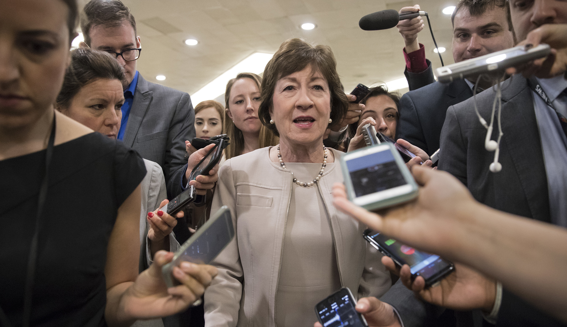 On hot mic, Susan Collins questions whether Trump knows about defense budget caps