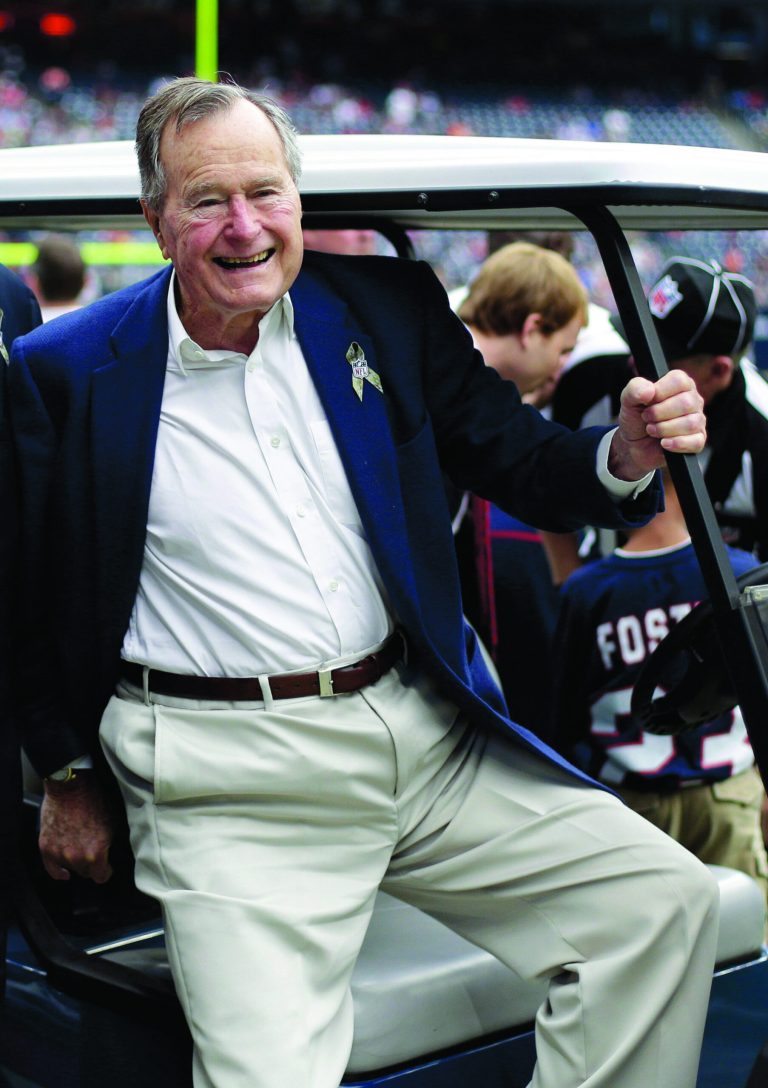 FILE - In this Nov. 4, 2012 file photo, former president George H.W. Bush pauses for a photo before an NFL football game in Houston between the Buffalo Bills and the Houston Texans. A spokesman said Monday, Jan. 14, 2013 that the 88-year-old Bush has left a Houston hospital where he spent nearly two months recovering from an illness that began with a bronchitis-related cough. (AP Photo/Eric Gay, File)