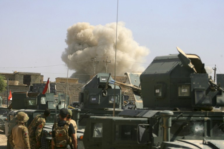 The U.S. military says it has been able to confirm just 14 unintended civilian deaths over a nine-month period of bombing in Iraq and Syria. (AP Photo/Anmar Khalil)