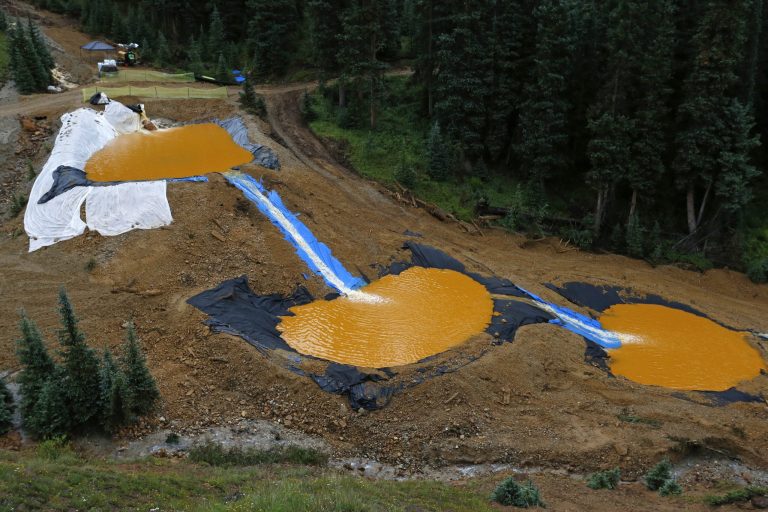 The EPA caused a 3-million gallon spill of toxic sludge in August that sullied the waters of three states. (AP Photo/Brennan Linsley)